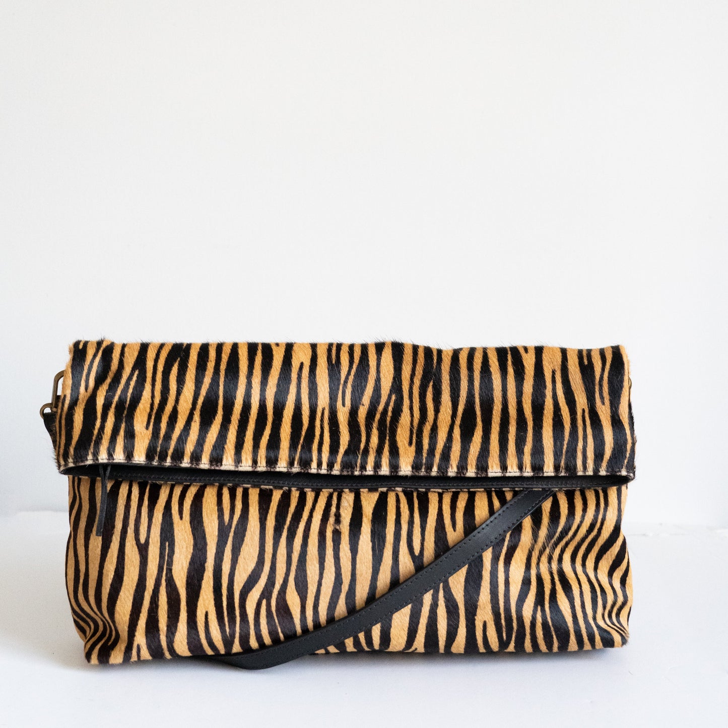 Clutch Tana Pelo Print