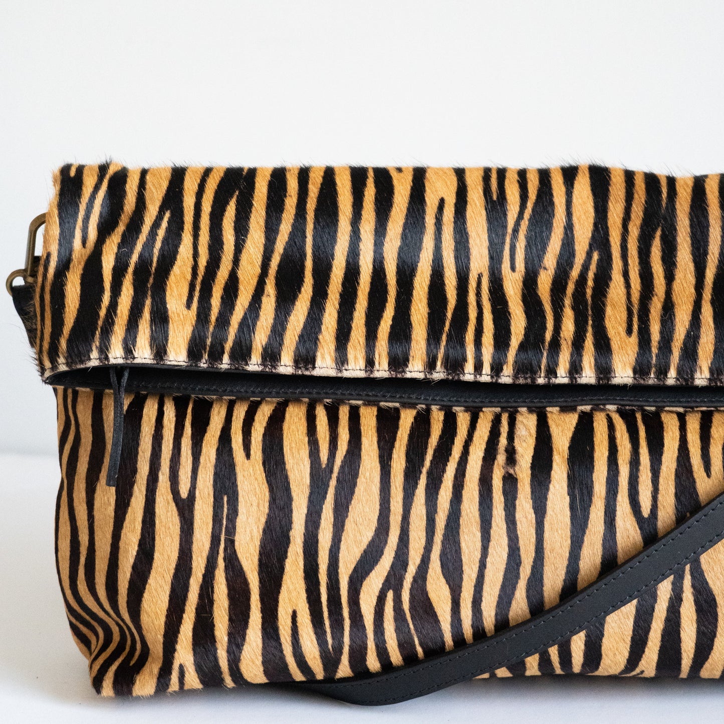 Clutch Tana Pelo Print